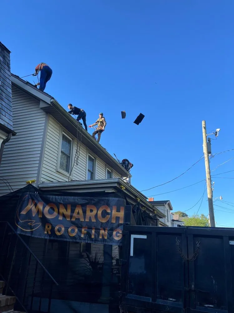 Slide of Monarch Roofing