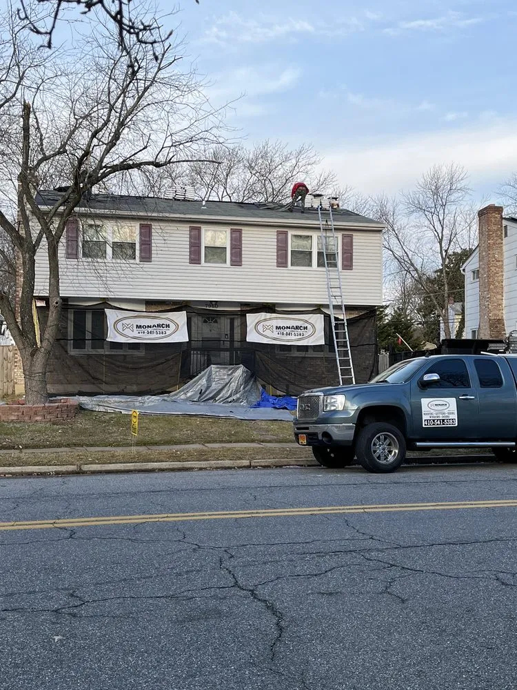 Slide of Monarch Roofing