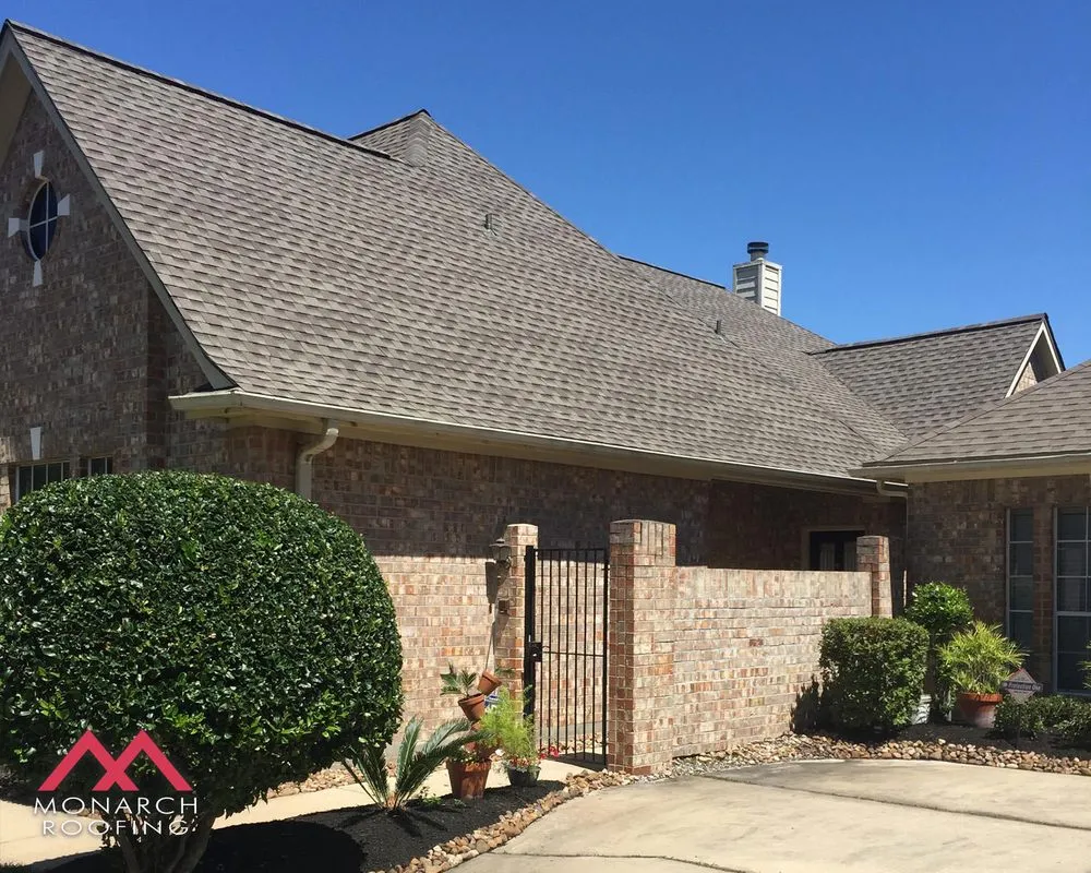 Slide of Monarch Roofing