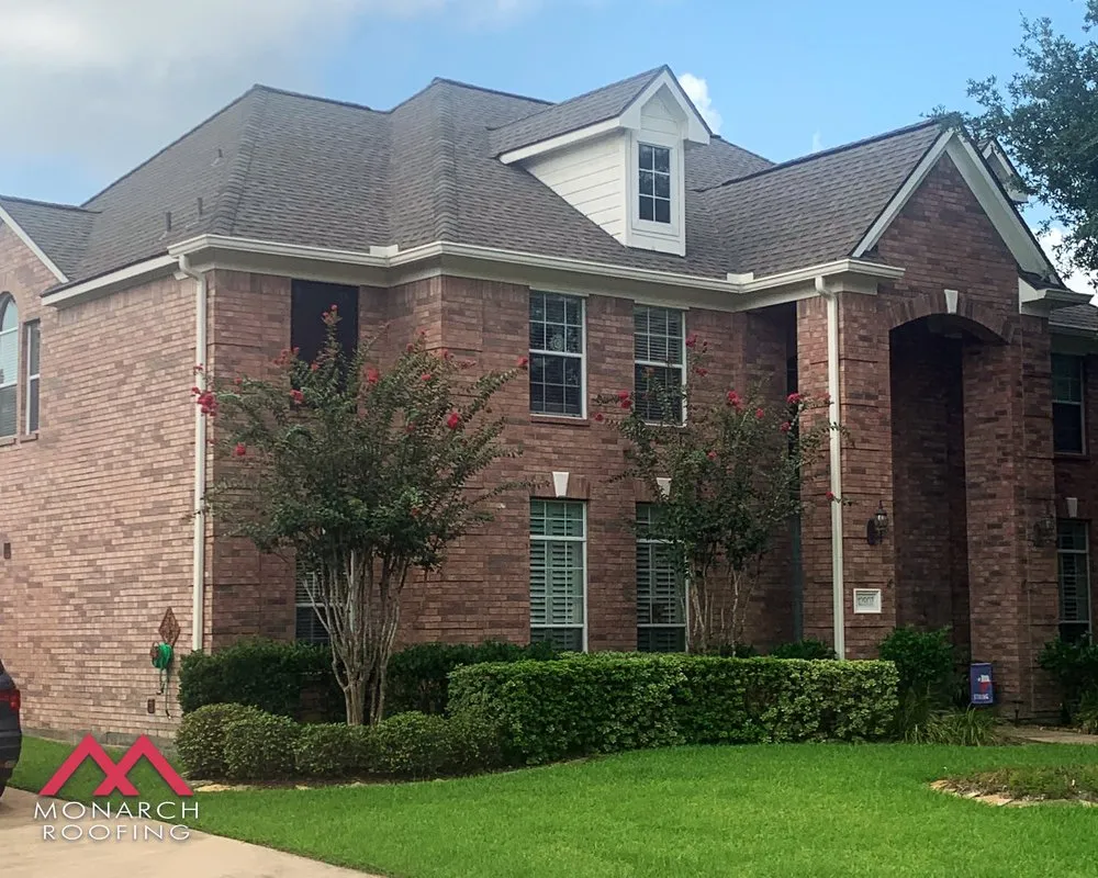 Slide of Monarch Roofing