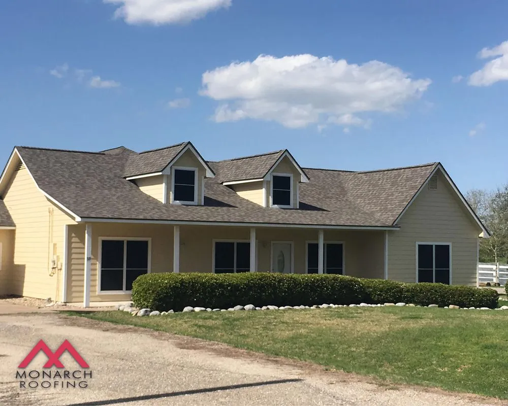 Slide of Monarch Roofing