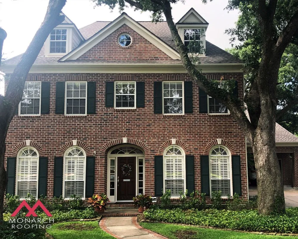 Slide of Monarch Roofing