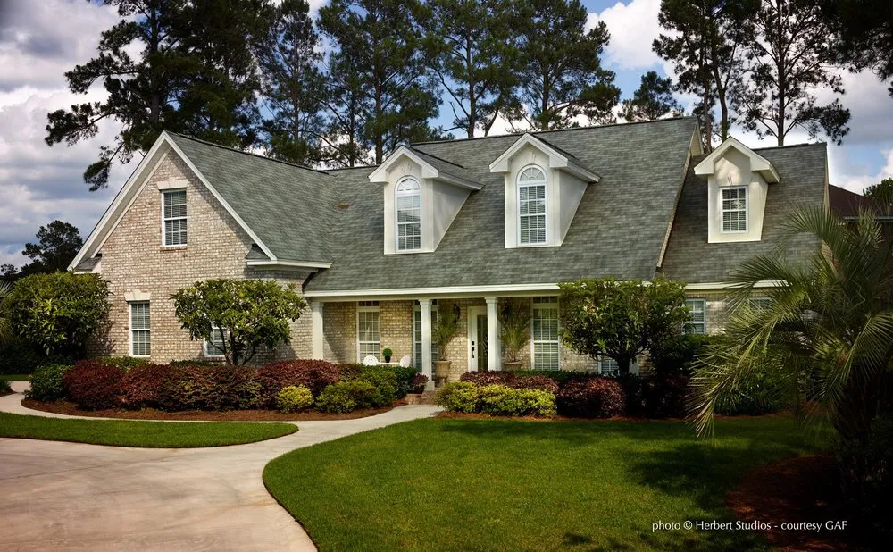 Slide of Monarch Roofing