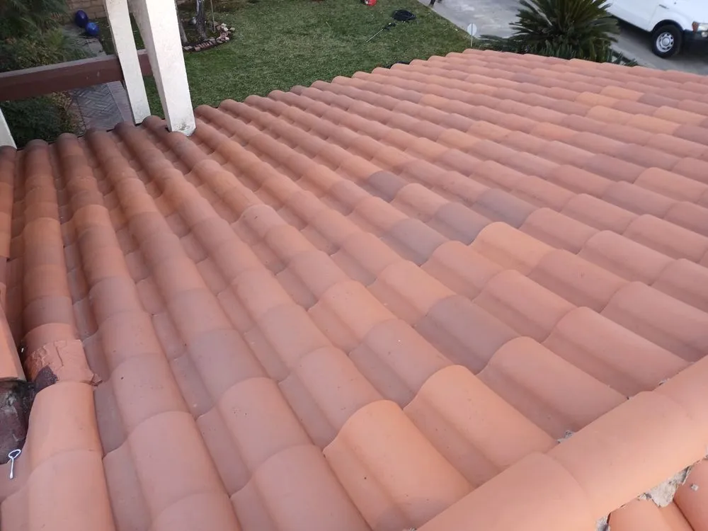 Slide of Monarch Roofing