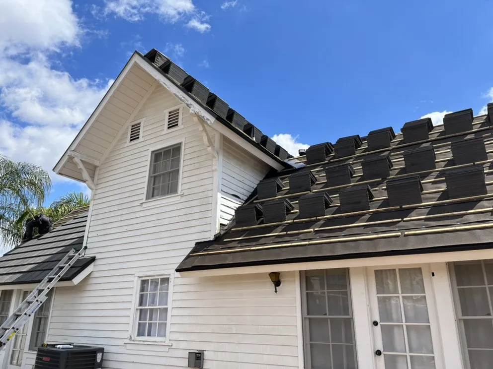 Slide of Monarch Roofing