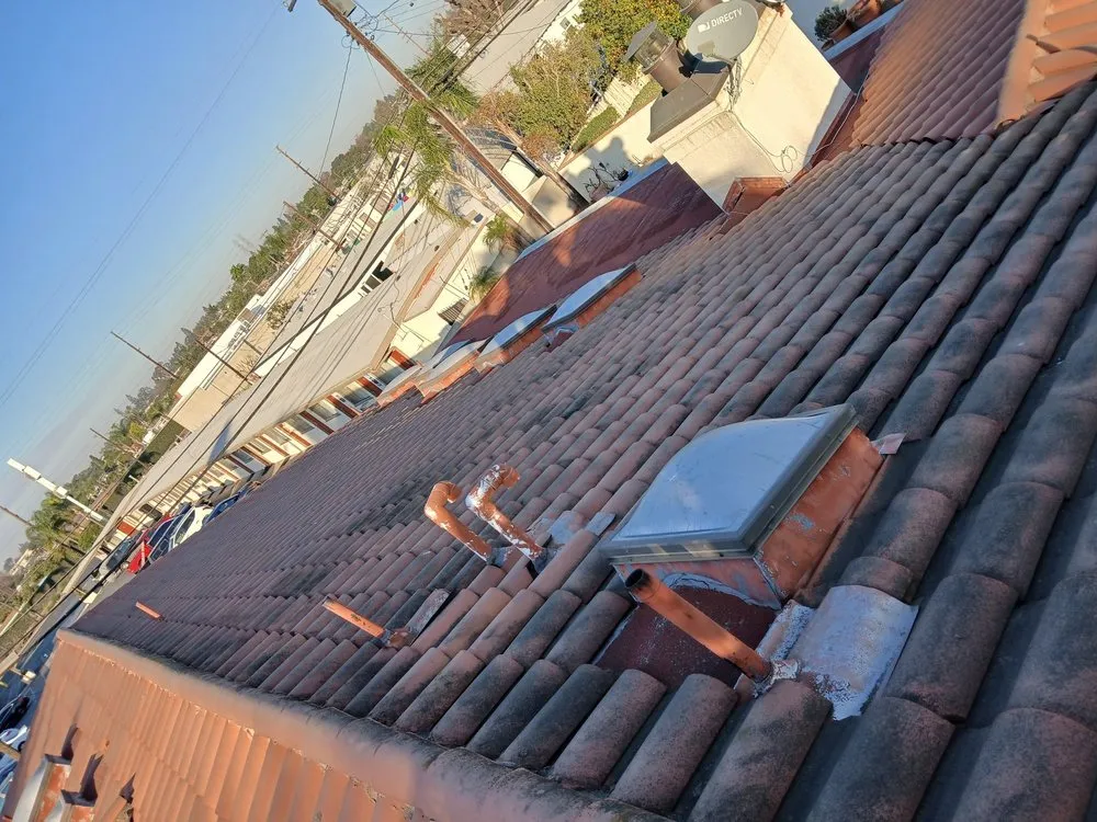 Slide of Monarch Roofing