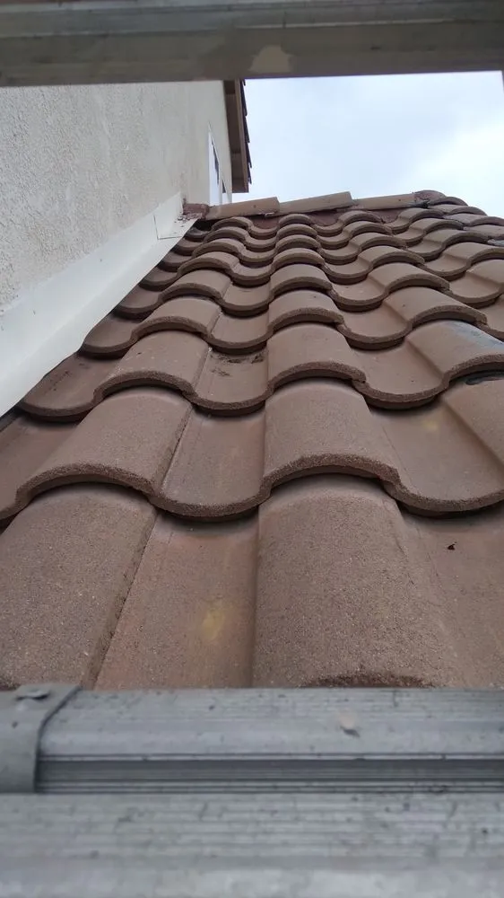 Slide of Monarch Roofing