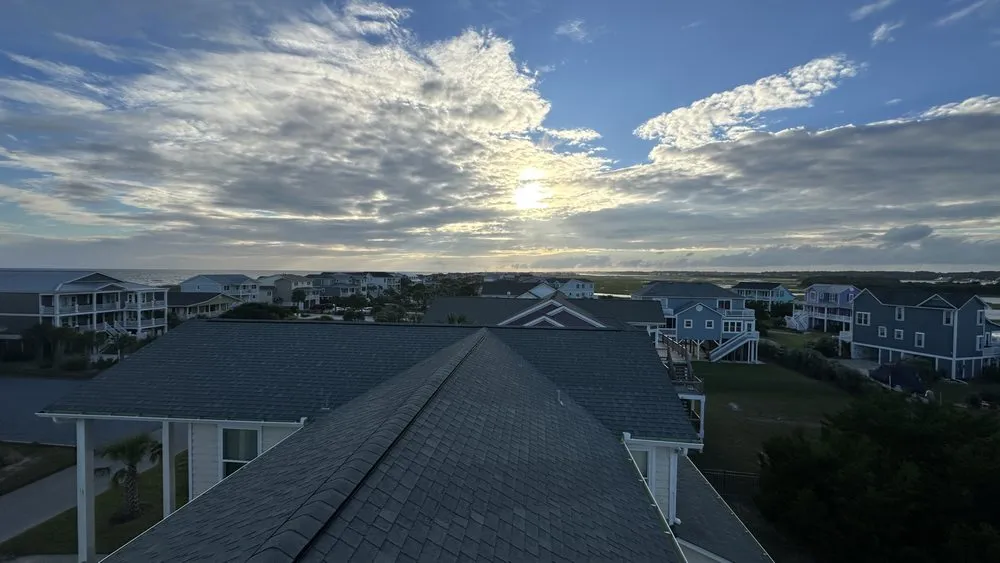 Slide of Monarch Roofing