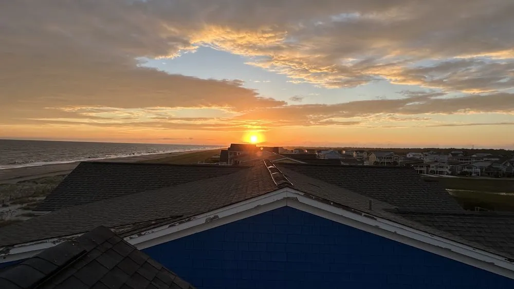 Slide of Monarch Roofing