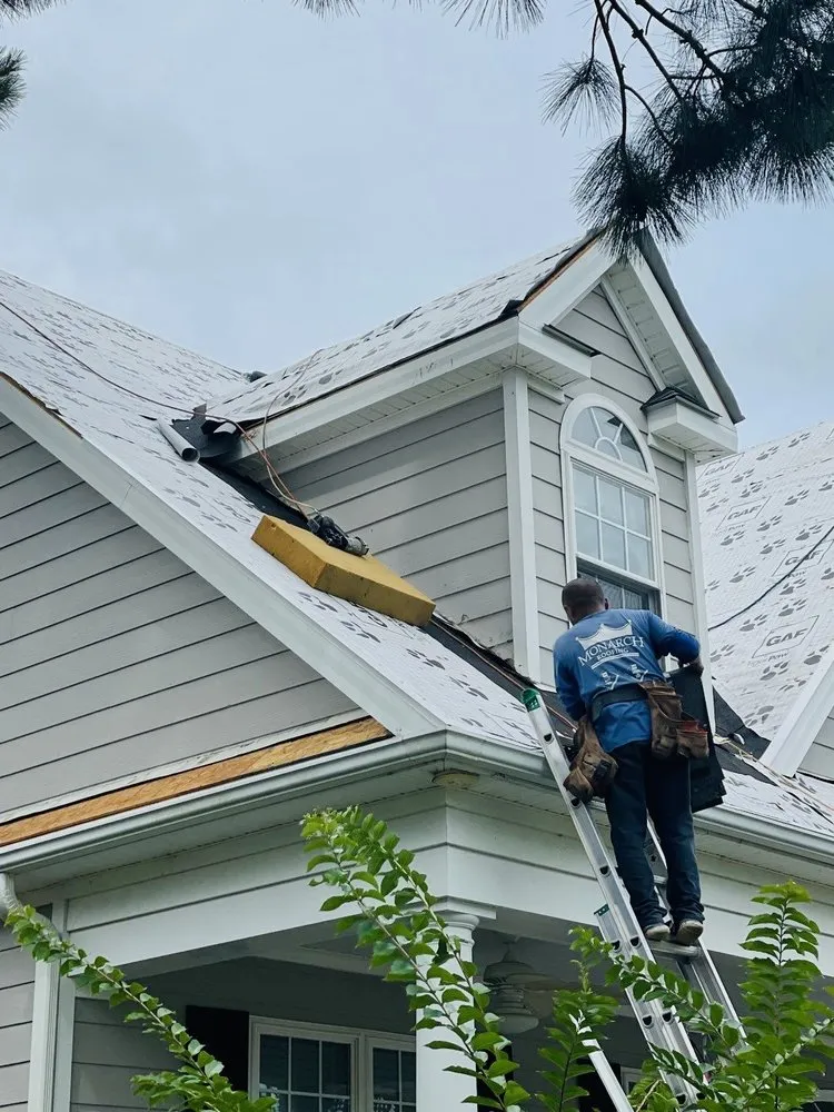 Slide of Monarch Roofing