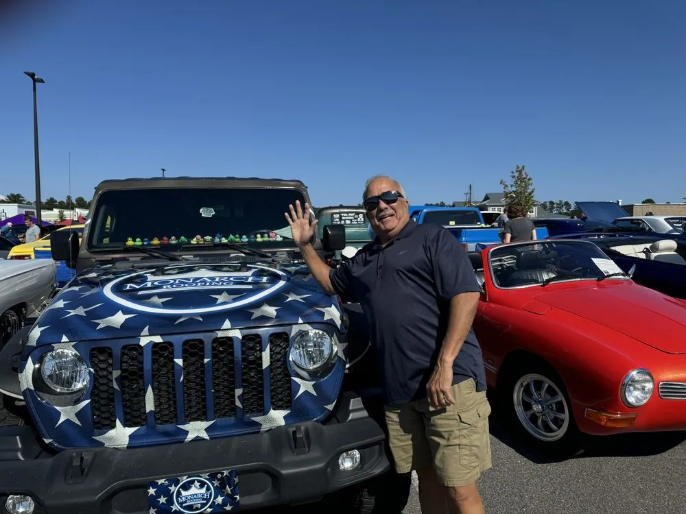 Slide of Monarch Roofing