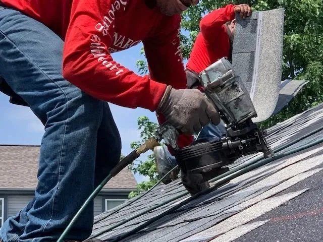 Slide of Monarchs Roofing