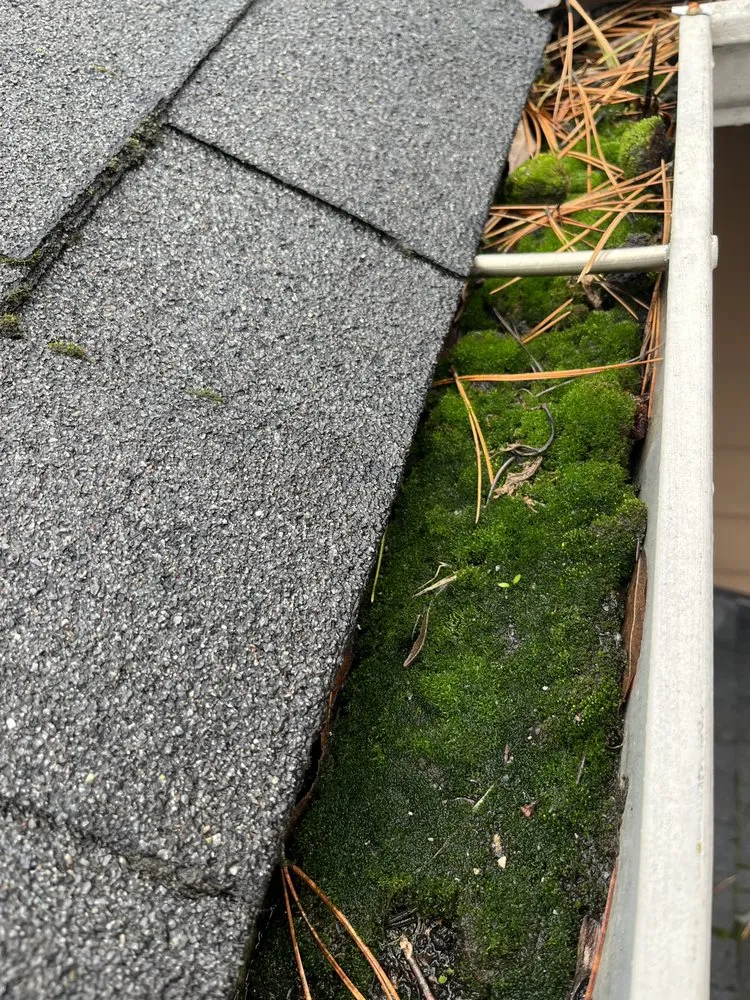 Slide of Monsoon Roofing & Gutter Pros