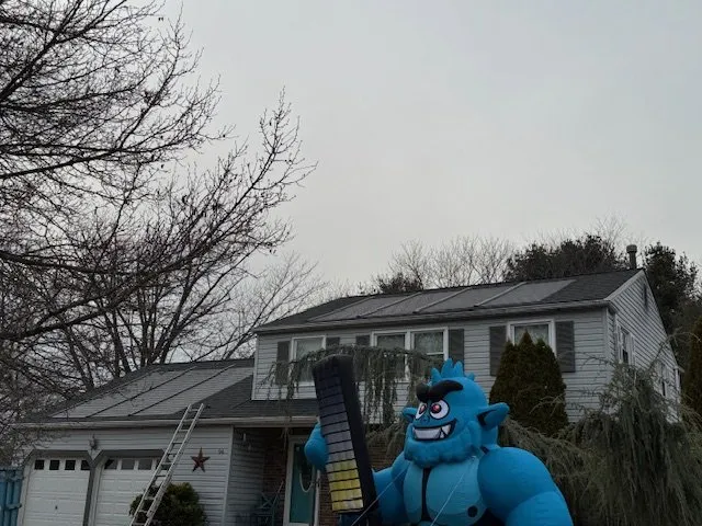 Slide of Monster Roofing & Solar