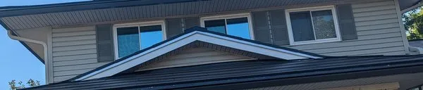 Monumental Construction Logo