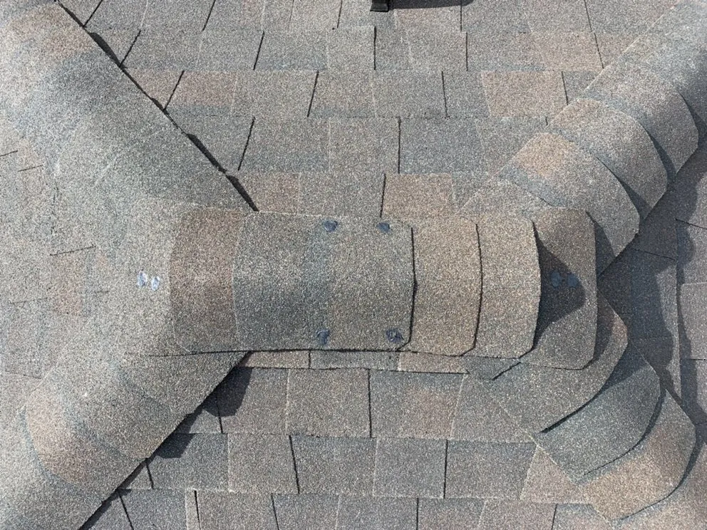 Slide of Monumental Roofing