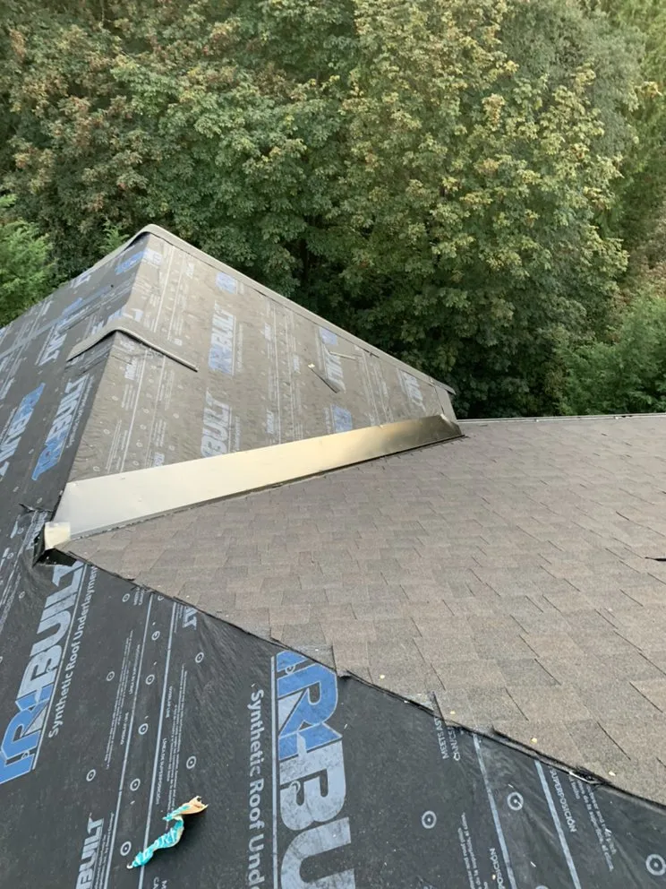 Slide of Monumental Roofing