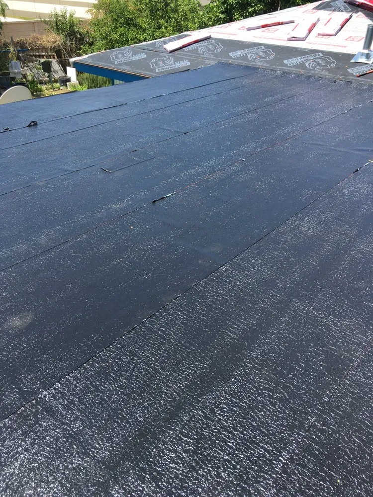 Slide of Monumental Roofing Services