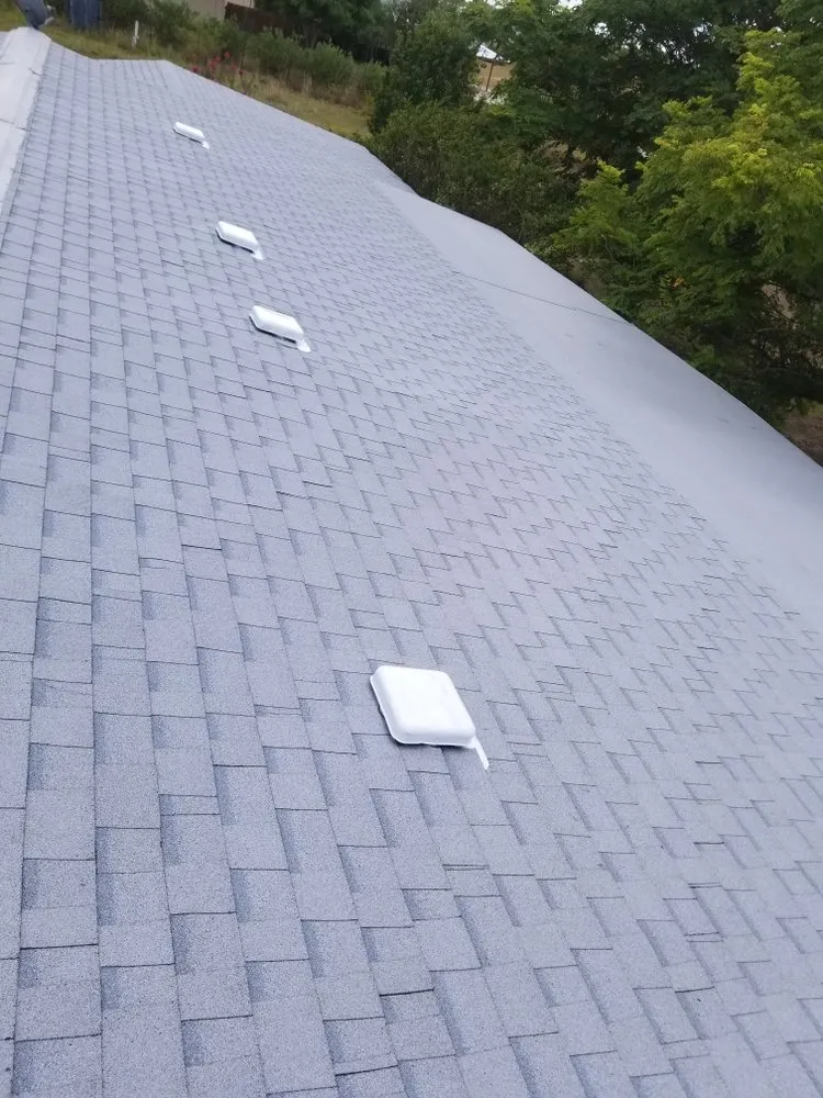 Slide of Monumental Roofing Services