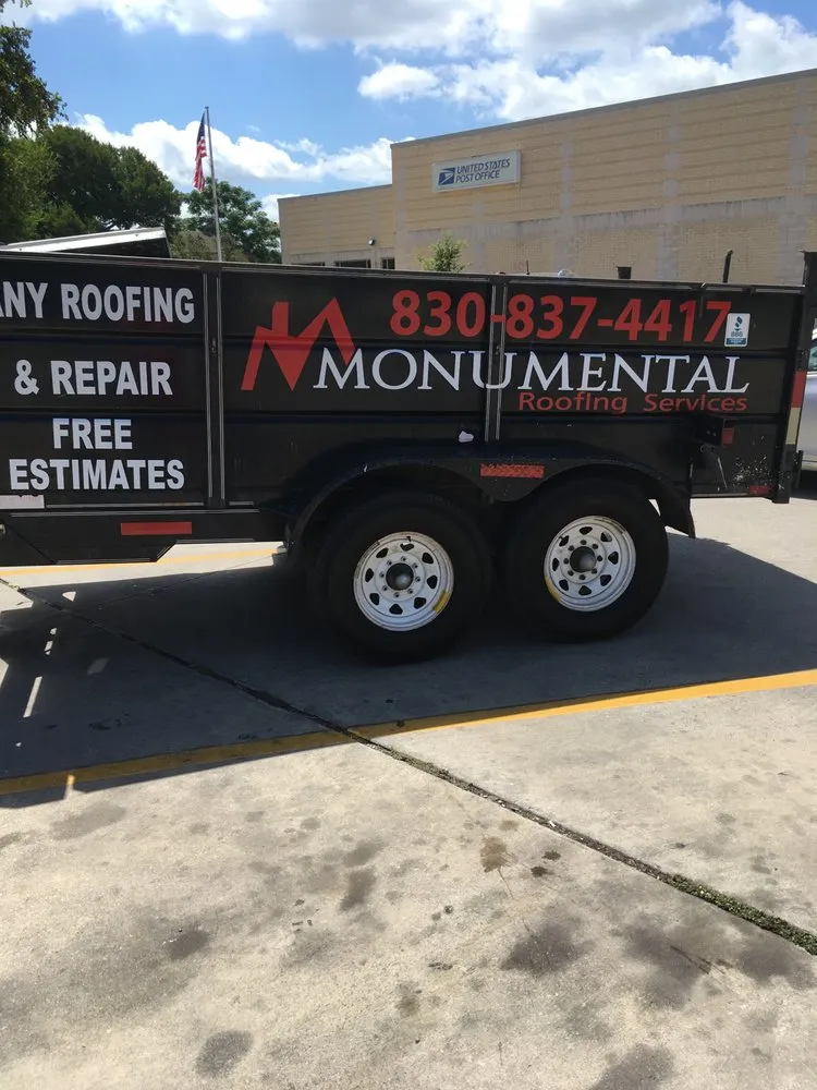 Slide of Monumental Roofing Services