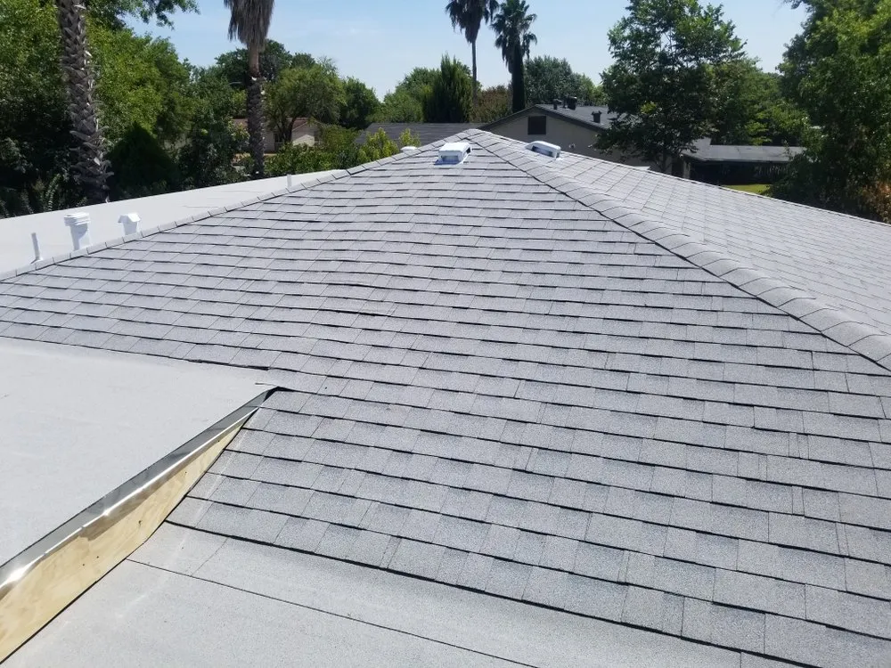 Slide of Monumental Roofing Services