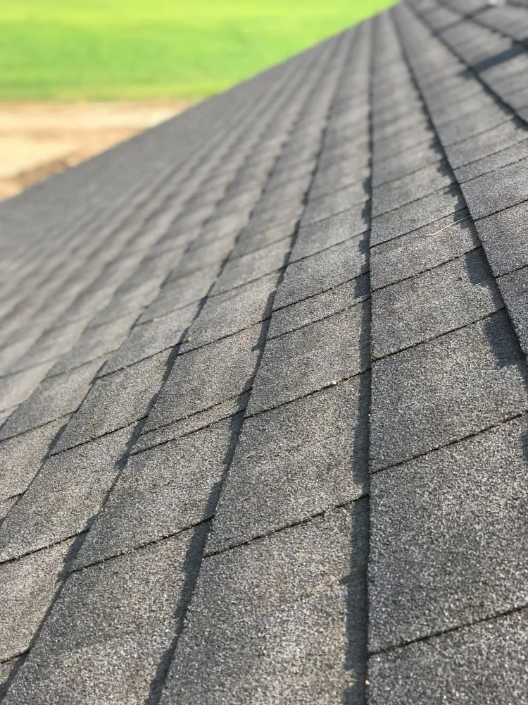 Slide of Moon Roofing & Construction