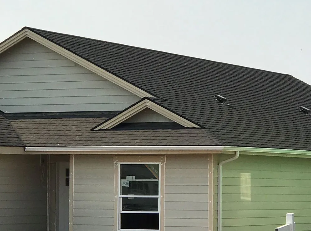 Slide of Moon Roofing & Construction