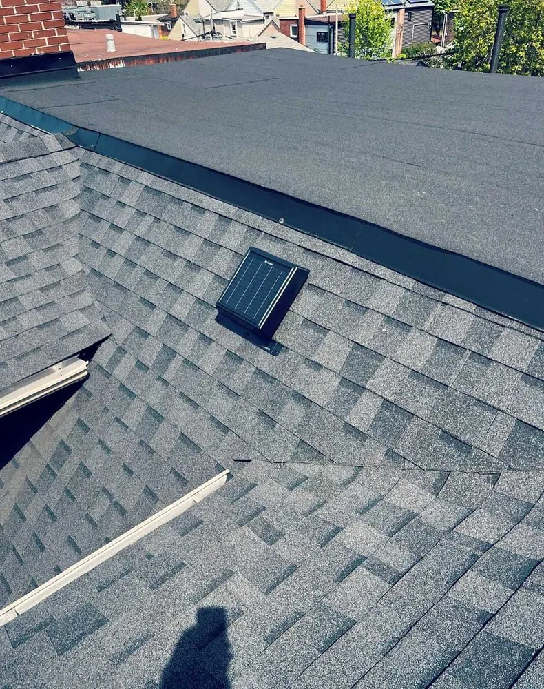 Slide of Moon Valley Roofing