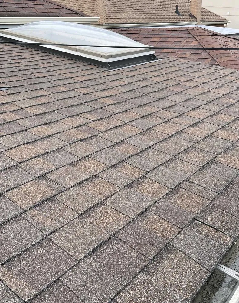 Slide of Moon Valley Roofing