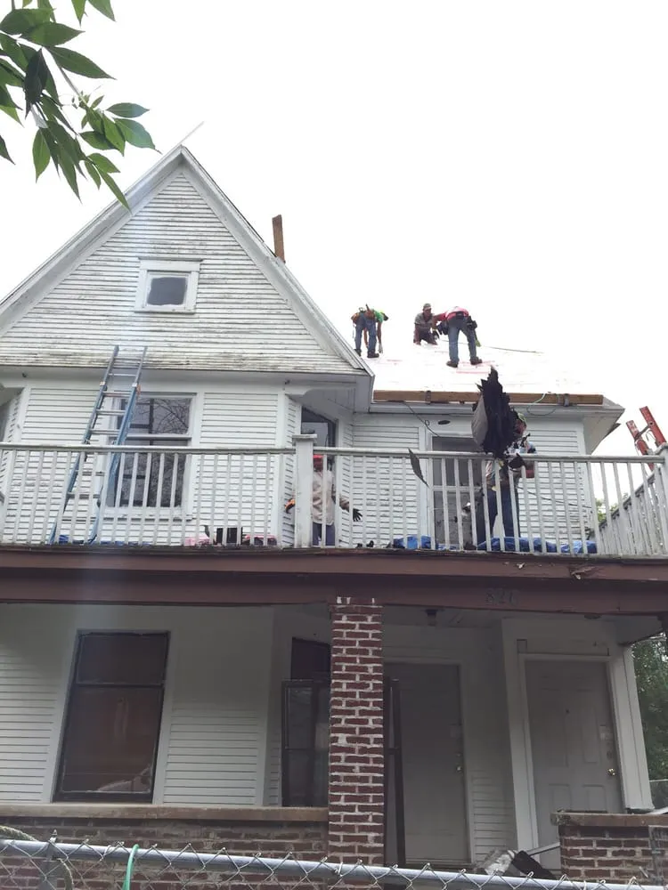 Slide of Moore & Sons Roofing