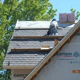 Slide of Moore & Sons Roofing