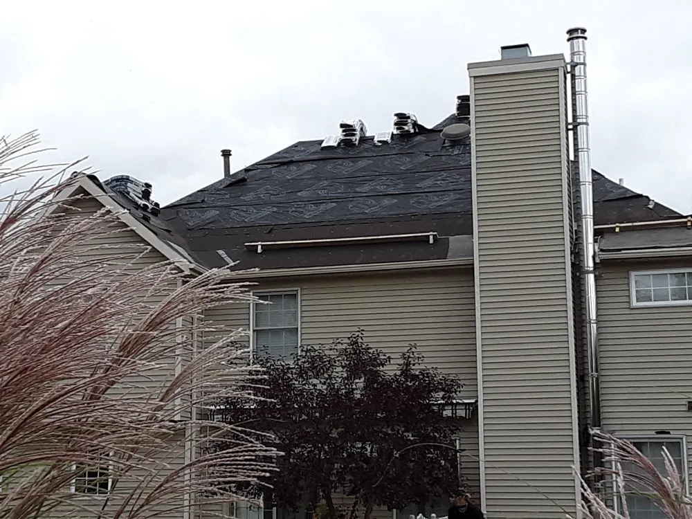 Slide of Moore Better Roofing