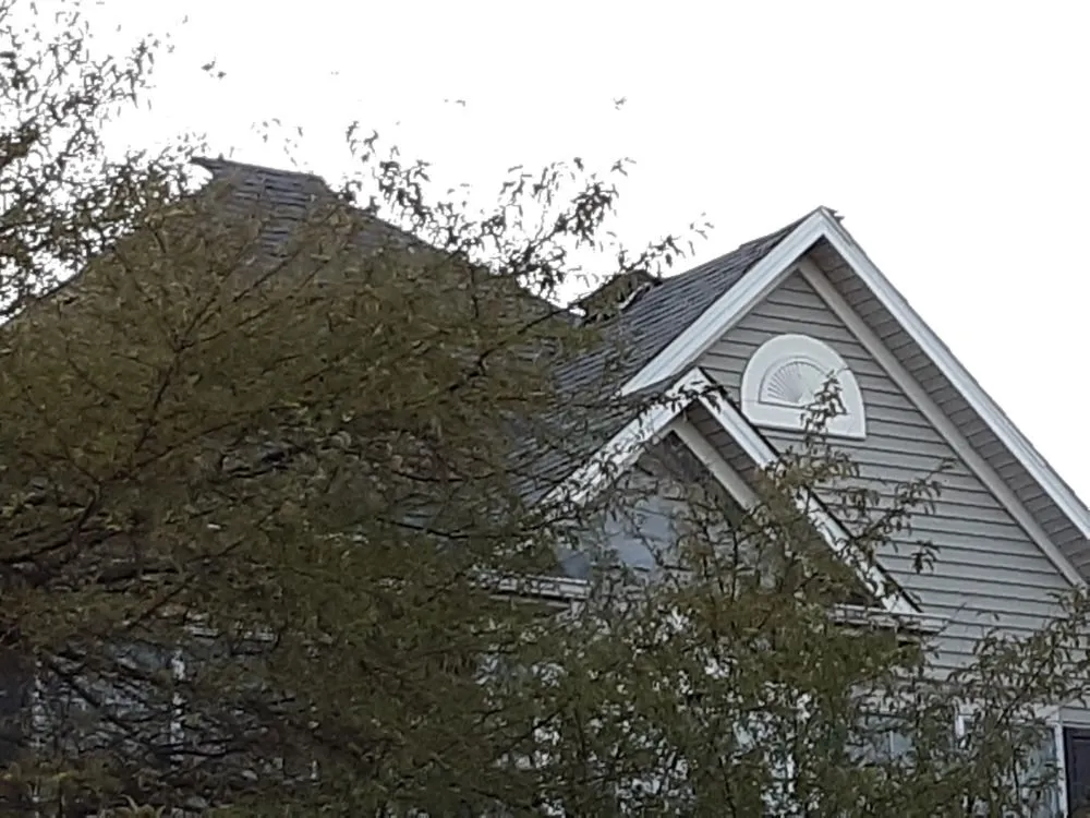 Slide of Moore Better Roofing