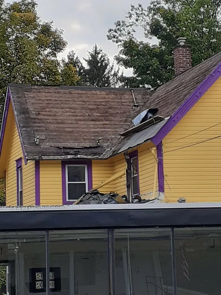 Slide of Moore Better Roofing