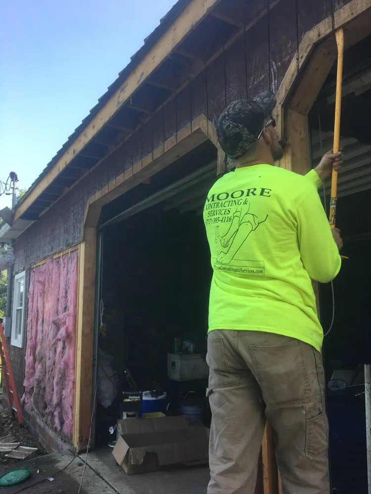 Slide of Moore Contracting and Services