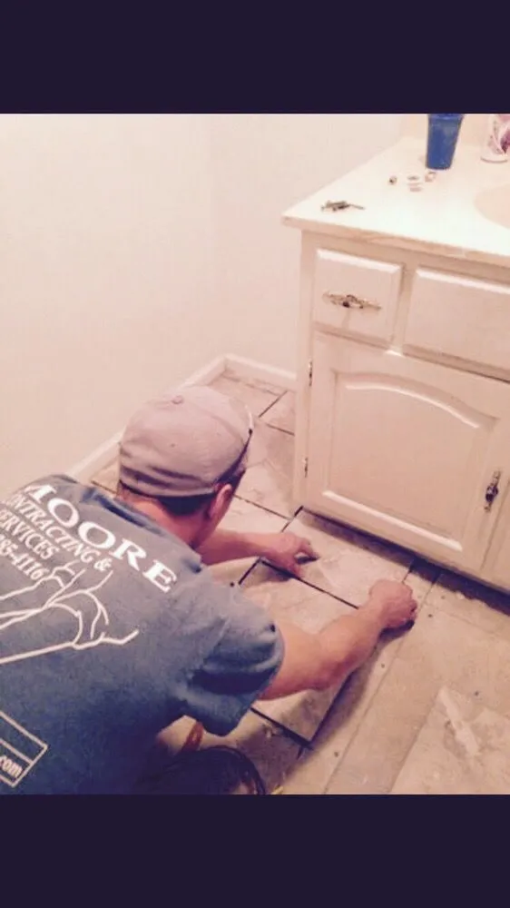 Slide of Moore Contracting and Services