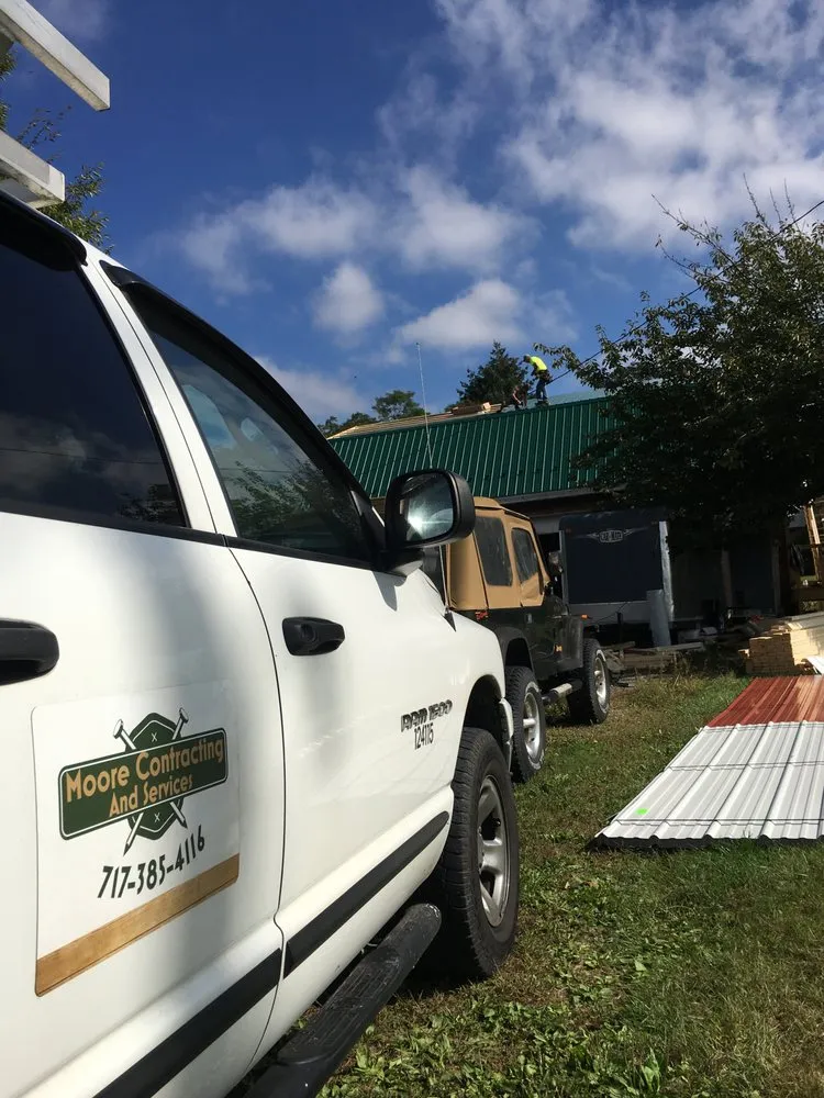 Slide of Moore Contracting and Services