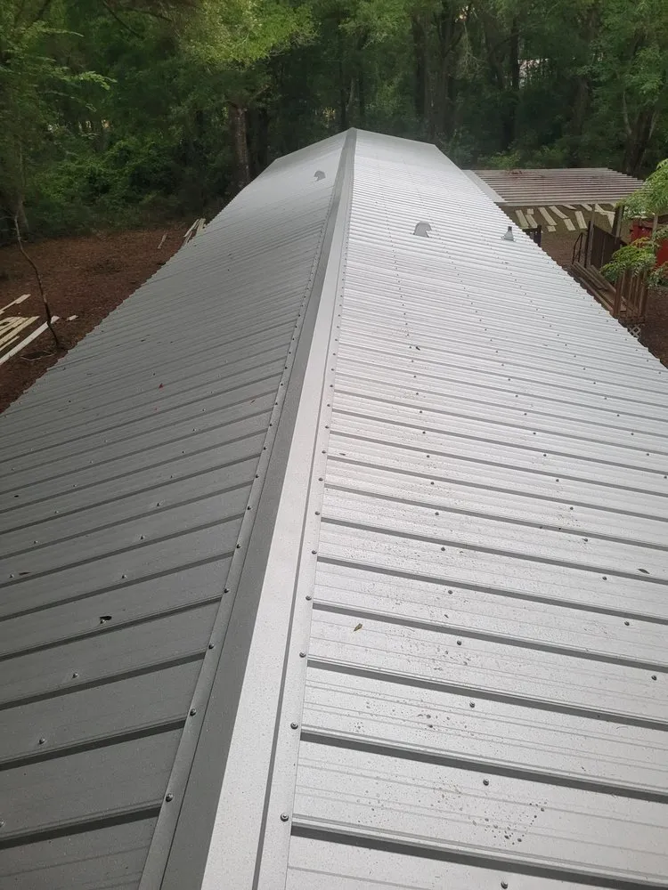 Slide of Moore Elite Roofing