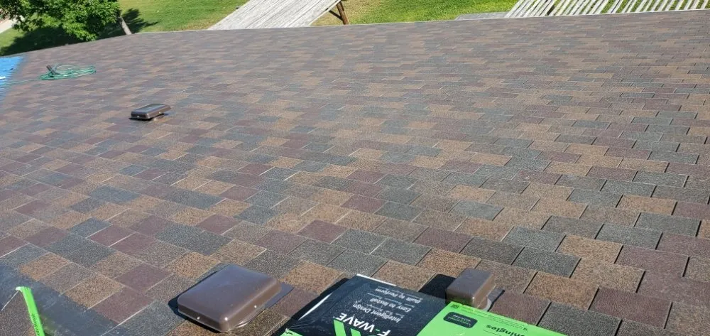 Slide of Moore Roofing