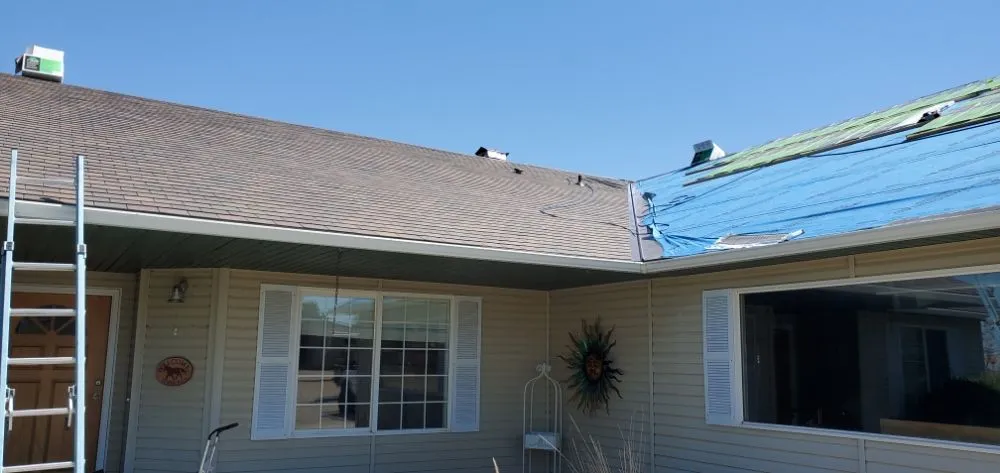 Slide of Moore Roofing