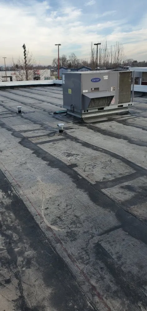 Slide of Moore Roofing