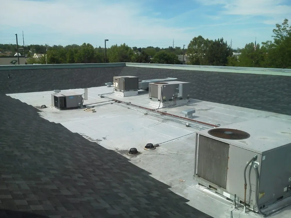 Slide of Moore Roofing