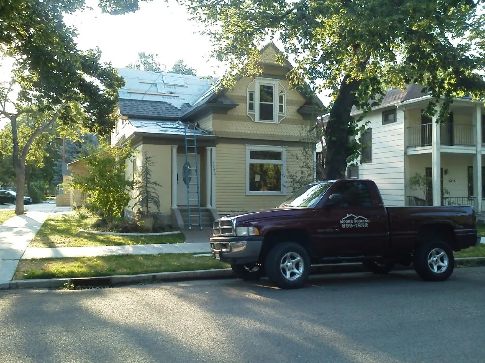 Slide of Moore Roofing