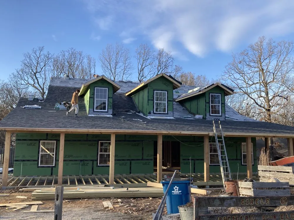 Slide of Moore Roofing