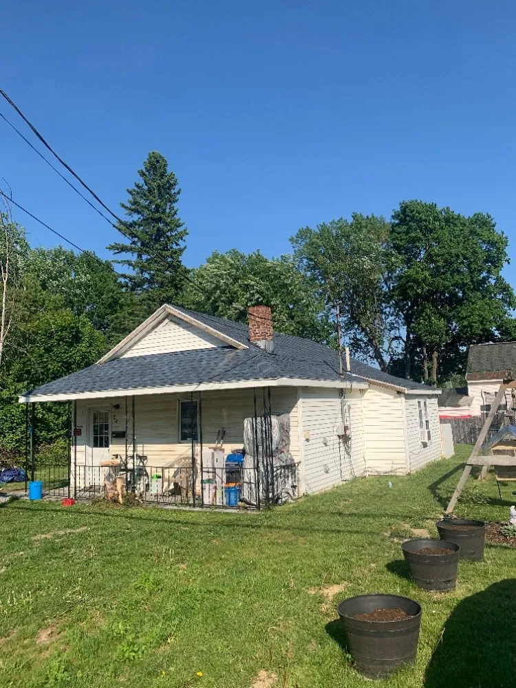 Slide of Moore Than Roofs