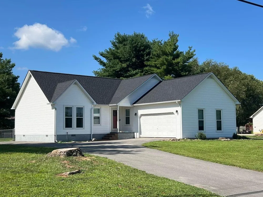 Slide of Moores Roofing