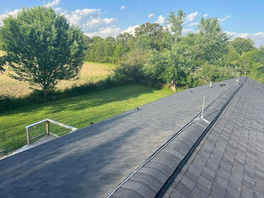 Slide of Moores Roofing