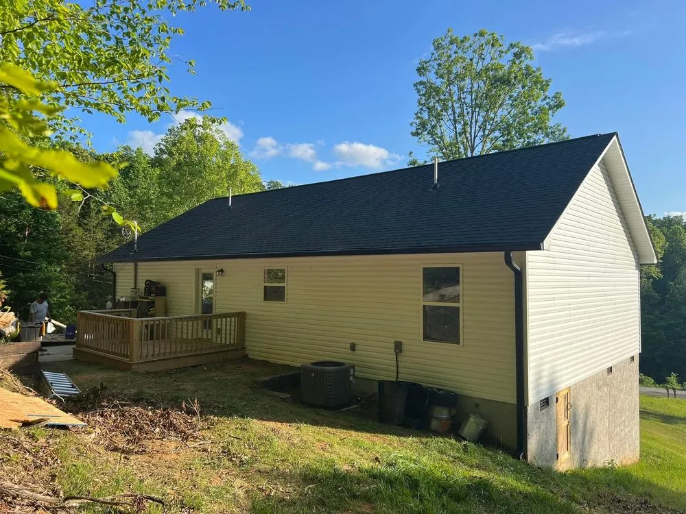 Slide of Moores Roofing