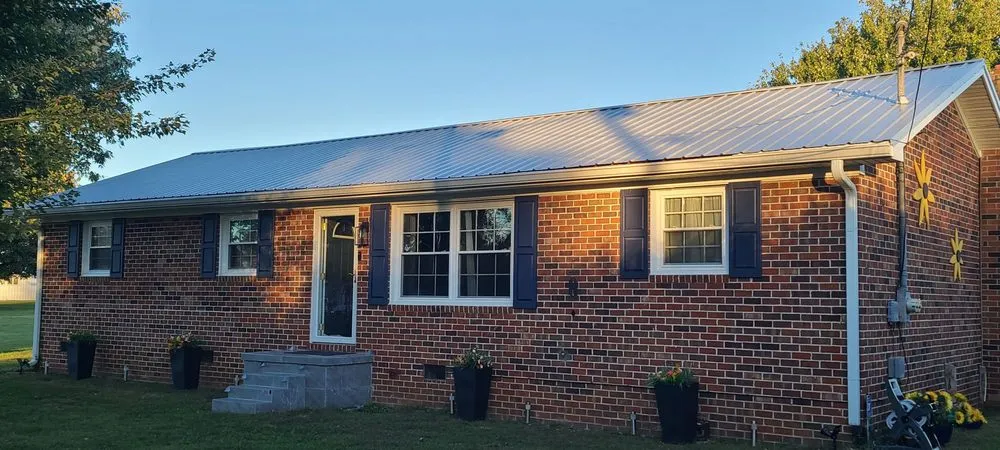 Slide of Moores Roofing