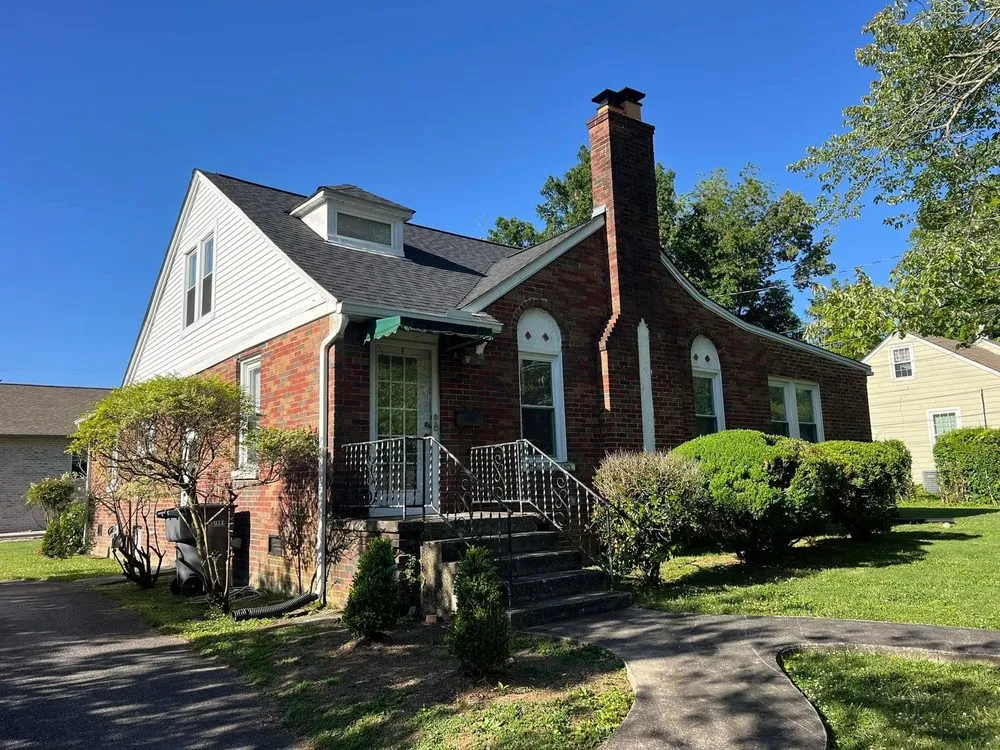 Slide of Moores Roofing